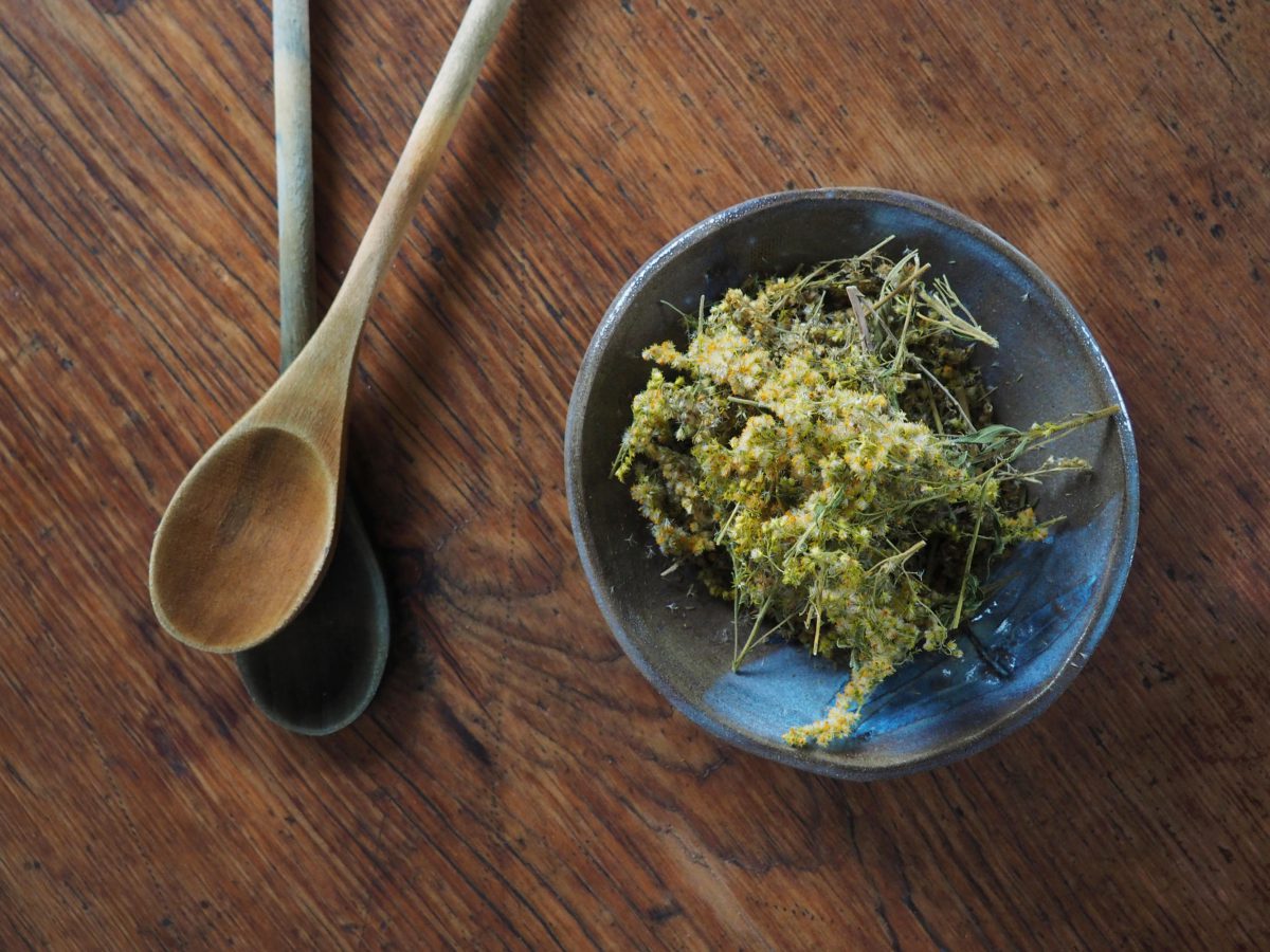 Goldenrod natural plant dye in a bowl