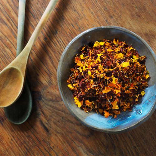 A bowl of marigold petals